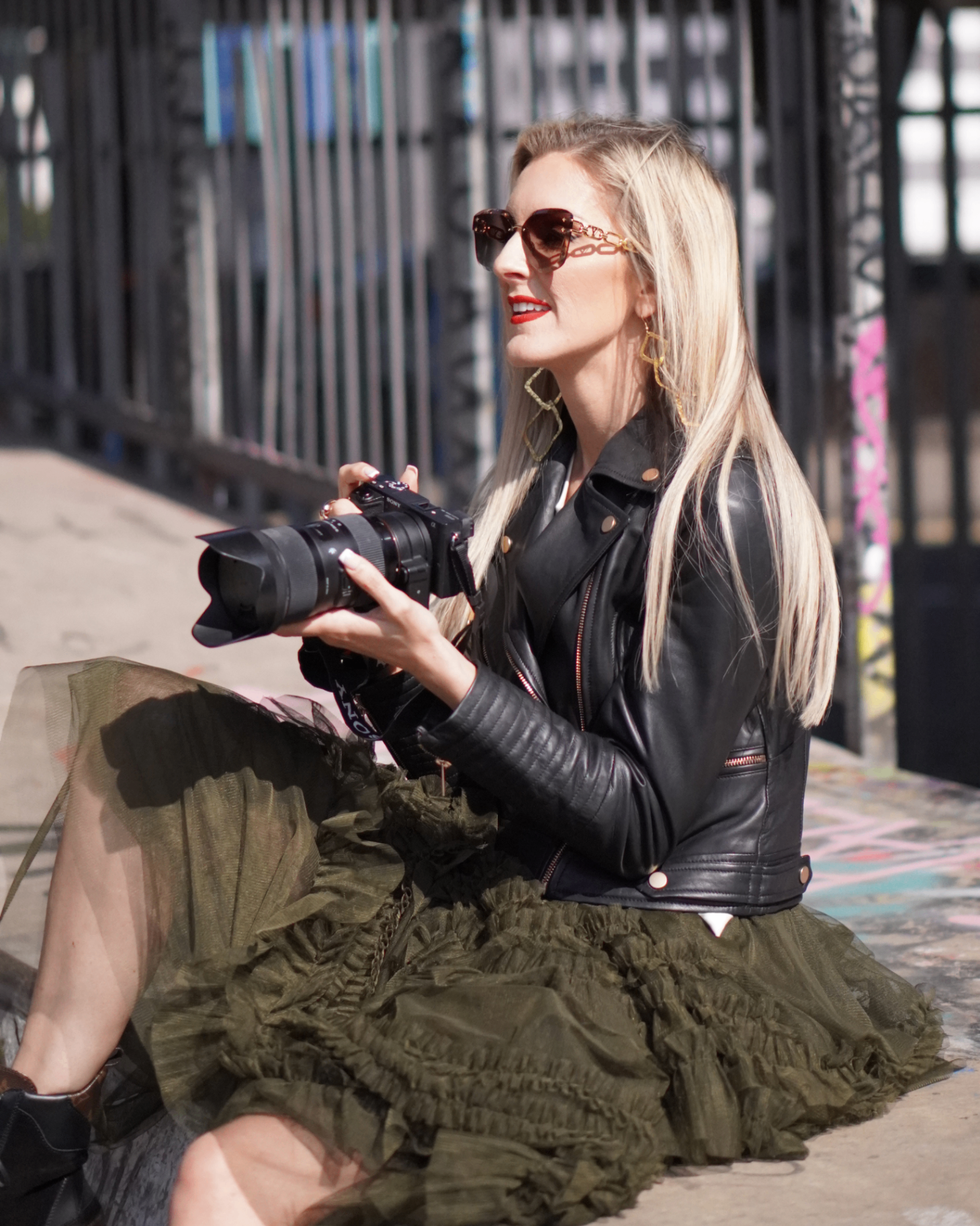 Loraa White, founder and director of Music Video Marketplace, on set with her camera